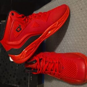 Brand New Q4 Basketball Shoe Size 10 Racing Red.